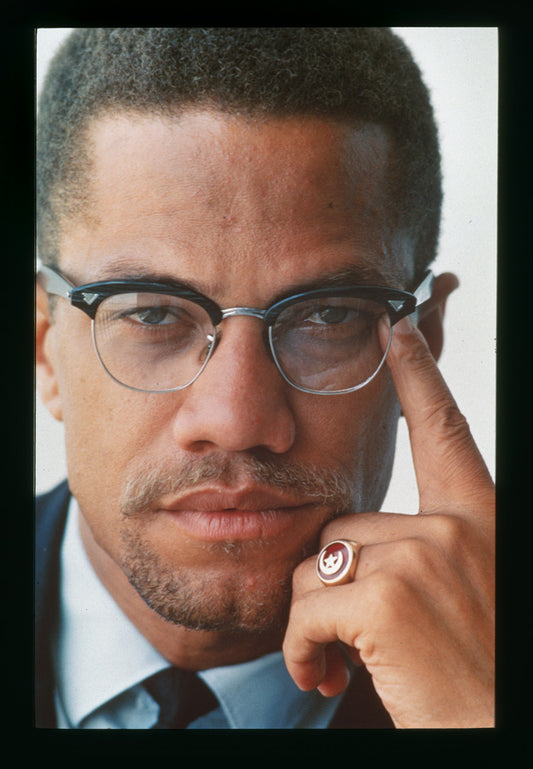 Malcolm X Portrait - Photo by John Launois